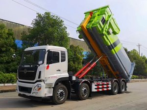 勾臂式垃圾车报道-重汽28吨多功能拉臂车
