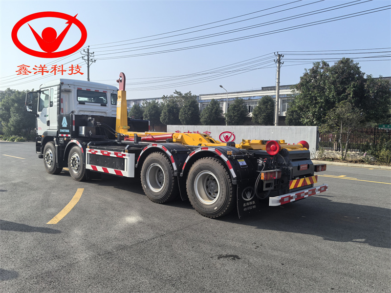 纯电动重汽汕德卡8×4勾臂垃圾车